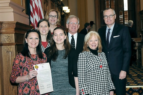 Sen. Renee Unterman, R-Buford, (back row) read SR 793 at the state capital Feb. 9. Also present for the reading were, first row, from left, Cindy Seay, wife of Dr. Thomas Seay, and her daughter, Alex Hines; Nancy Paris, MS, FACHE, president, Georgia Core; (2nd row, l-r) Amy Sickles, PA-C, Dr. Seay’s physician assistant, Atlanta Cancer Care; Frederick Schnell, MD, FACP, chief medical officer, Georgia CORE; and Georgia Lt. Governor Casey Cagle.